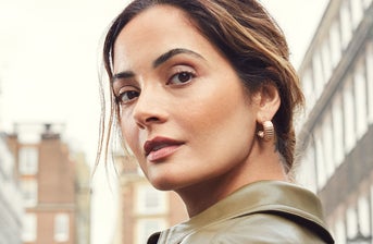 Woman with areas of face highlighted, in relation to injectable lifting-style dermal fillers that offer an anti-age boost
